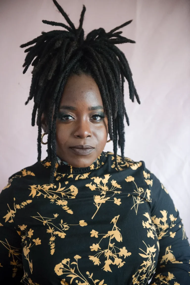 a woman stares intensely into the lens - a headshot shot by Hamilton headshot photographer : Pixelesque Photography