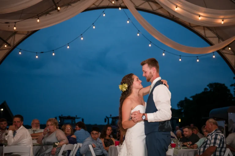 A couple share their first dance in a repurposed barn. Shot by Pixelesque Photography - Hamilton Wedding Photographer.