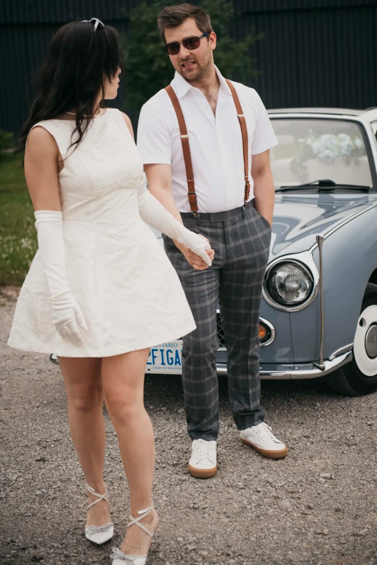 the woman looks back and leads her fiance. engagement session photographed at 5 drive in Oakville Ontario by Pixelesque Photography, hamilton wedding photographer.