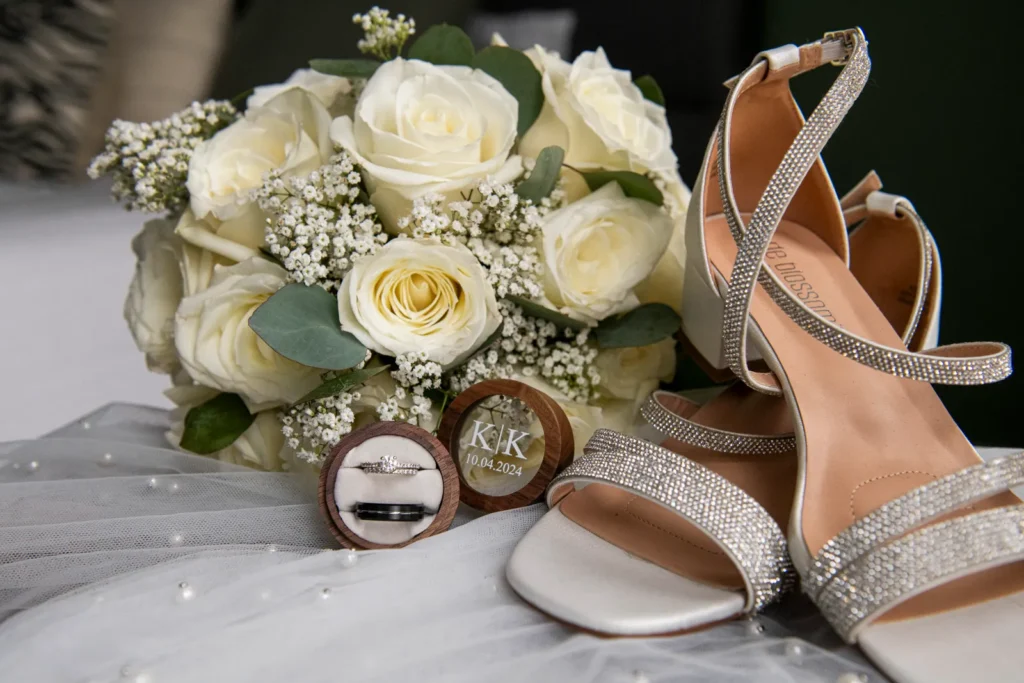 the brides details. Rings, bouquet, and shoes on her veil. Shot at Whistle Bear Golf Club by Pixelesque Photography - Hamilton Wedding Photographer.