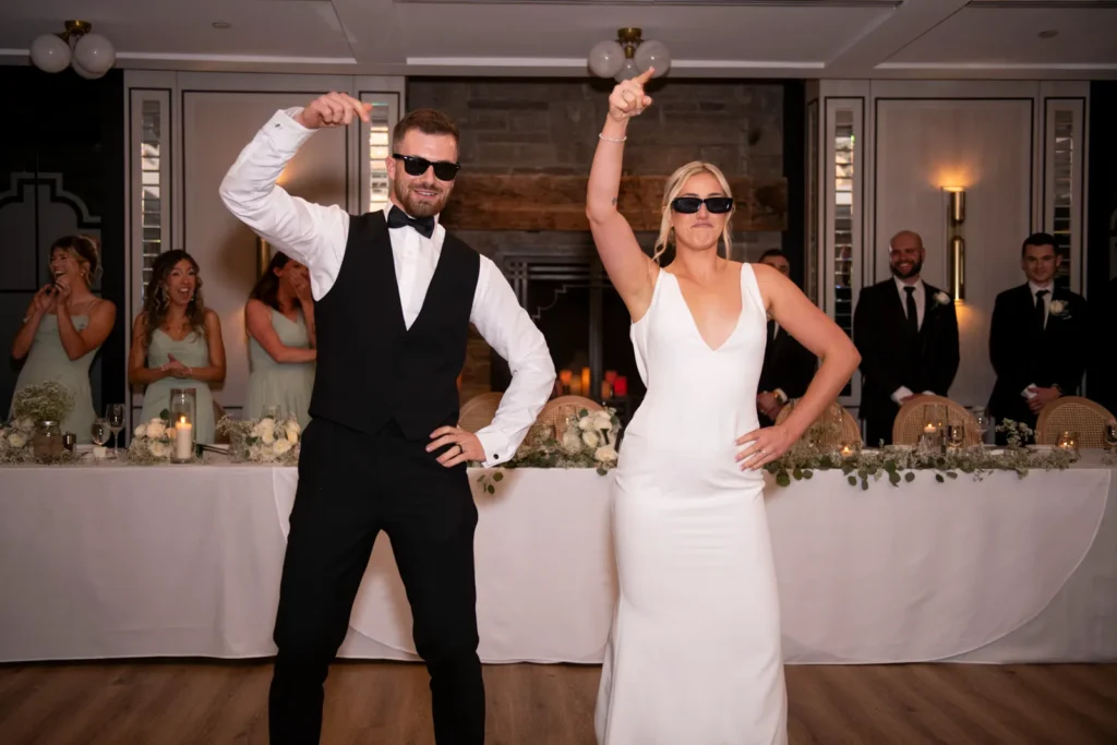 After the Rains : Kayla & Kyle's Whistle Bear Golf Club Wedding 33 the couple don sunglasses to do a fun dance. Shot at Whistle Bear Golf Club by Pixelesque Photography - Hamilton Wedding Photographer.