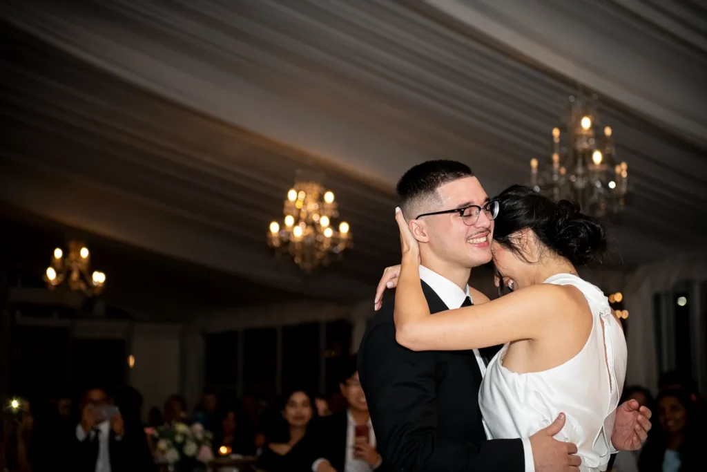 the bride and groom share their first dance. One of many beautiful moments from a wedding at Harding Waterfront Estate in Oakville, by Pixelesque Photography - Hamilton Wedding Photographer.