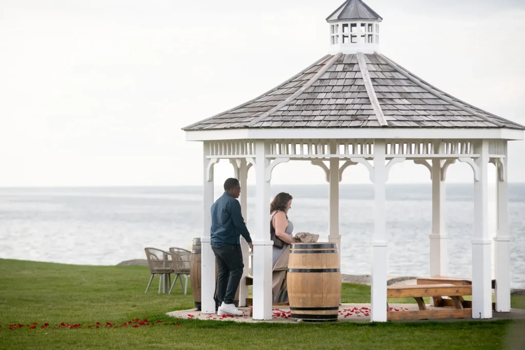 Surprise proposal at Konzelmann Estate Winery in Niagara-on-the-Lake overlooking Lake Ontario