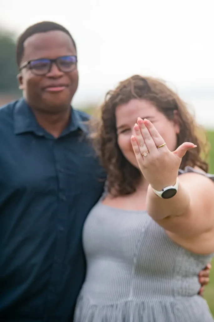 Newly engaged couple celebrating their proposal at Konzelmann Estate vineyard in Niagara