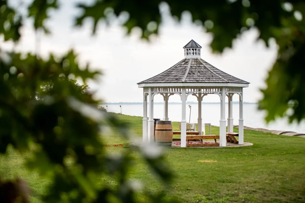 Surprise proposal at Konzelmann Estate Winery in Niagara-on-the-Lake overlooking Lake Ontario
