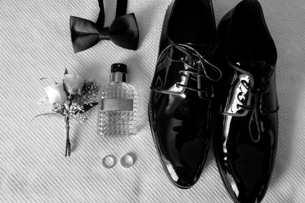 the groom's details laid out on the bed. Shot in C hotel, Hamilton by Pixelesque Photography.