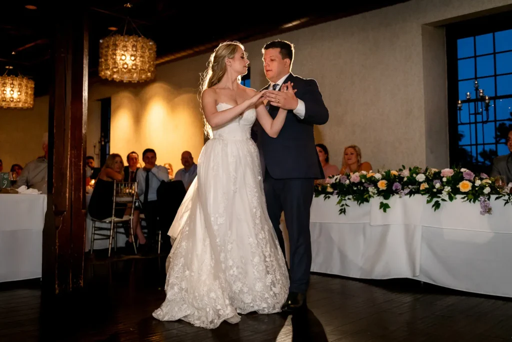 a wedding couple prepare for their first dance in the governor's room at Ancaster Mill in Hamilton, Ontario.