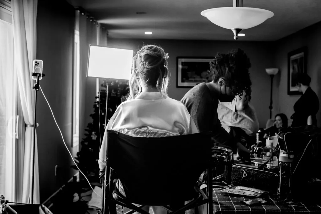 Kim getting ready with bridesmaids at home wedding morning