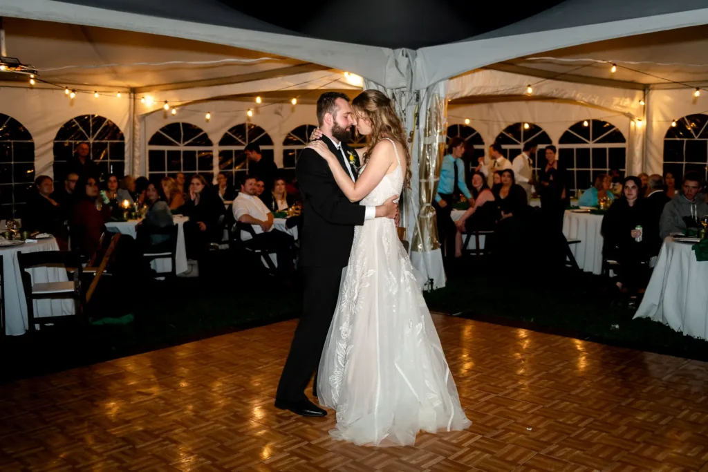 a bride and groom have their first dance in the night at Homegrown Hideaway in Norfolk County, Ontario.