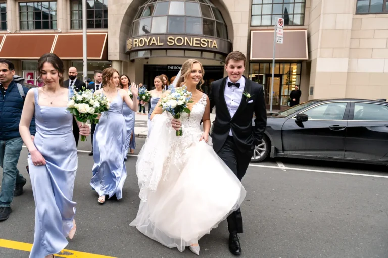 Bridal party crossing road outside Royal Sonesta Yorkville, Toronto