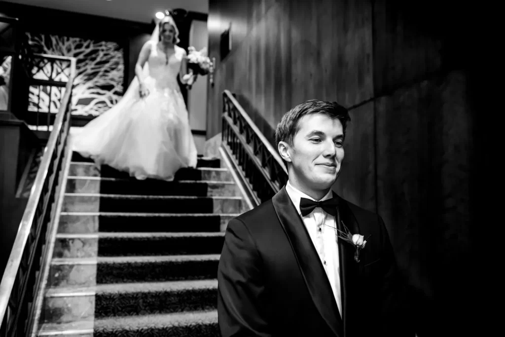 Matt and Amanda first look on grand staircase Royal Sonesta Yorkville