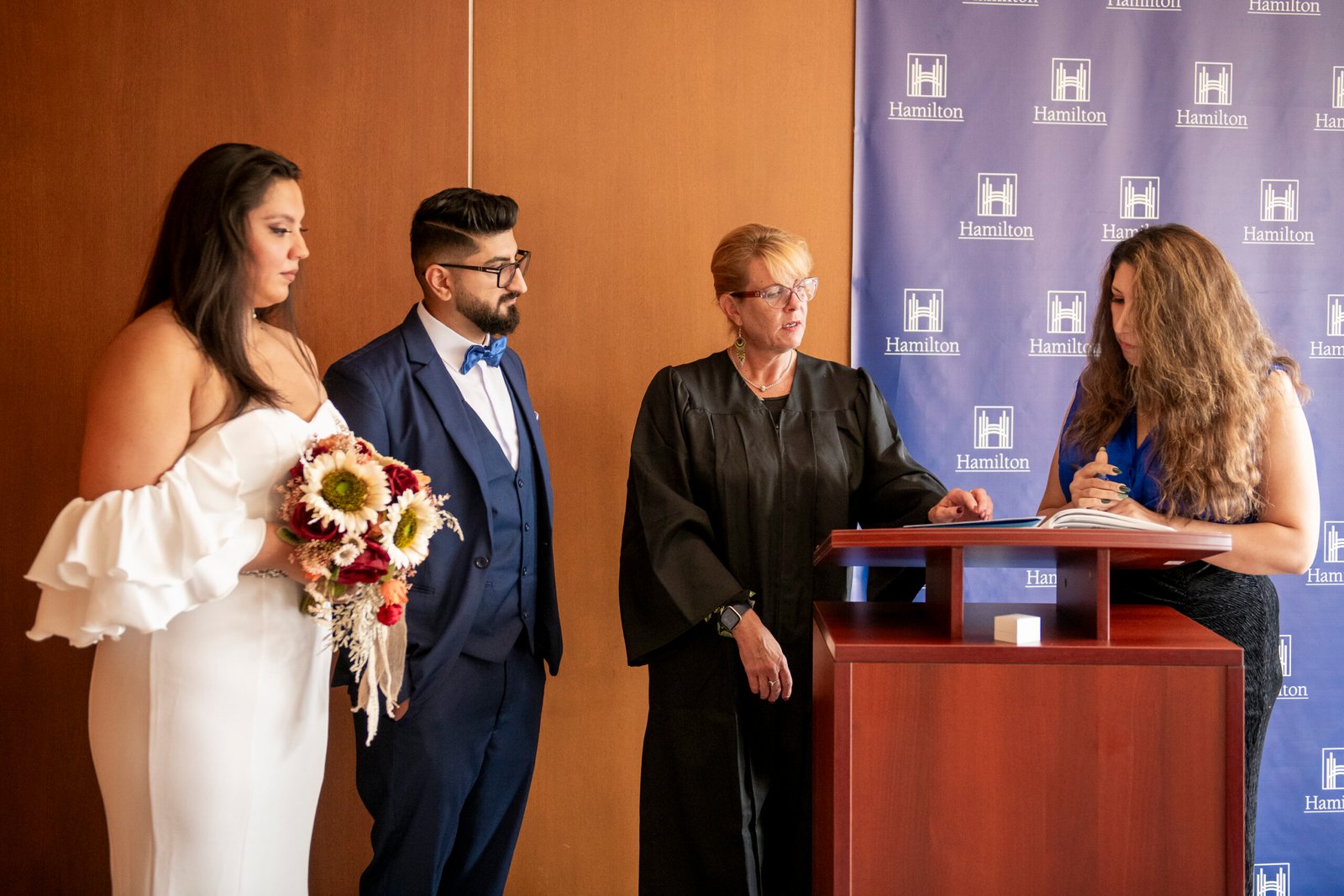 a couple get married at Hamilton City Hall