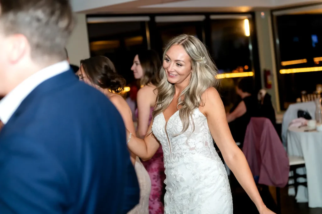 the bride dances with her friends
