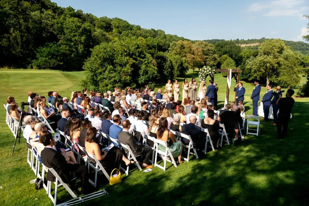 a wide view of the wedding ceremony at dundas valley golf and curling club