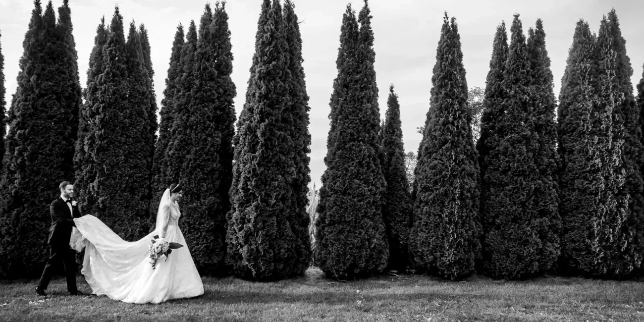 Wedding couple portrait in tree lined path at The Barn Event Space Uxbridge Ontario