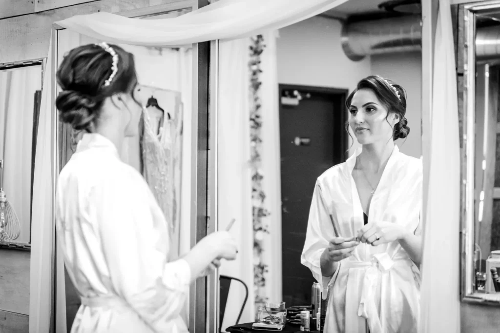 Bride getting ready bridal suite The Barn Event Space Brooks Farms