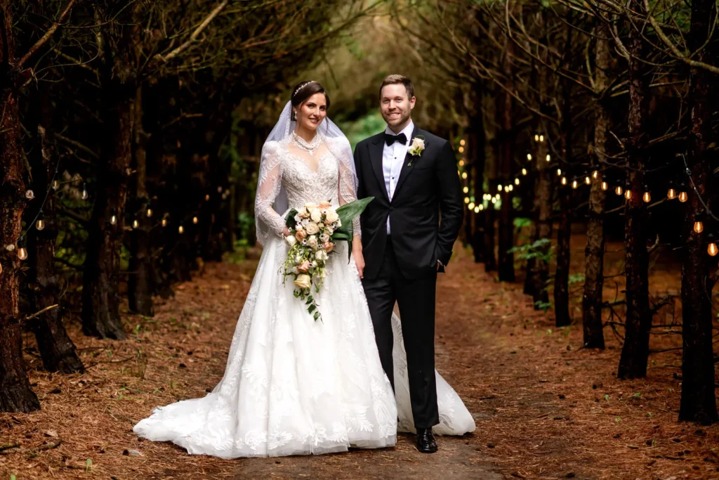 Wedding couple portrait in tree lined path at The Barn Event Space Uxbridge Ontario
